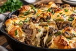 Cheesy Cheesy Philly Cheesesteak Skillet Bake recipe from Velvet Spoon Kitchen