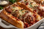 Cheesy Sunday Gravy Meatball Sub Bake recipe from Velvet Spoon Kitchen