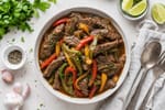 Slow Cooker Pepper Steak recipe from Ember Pot