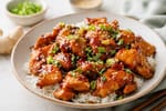 Sticky Honey Ginger Chicken recipe from The Frosted Fork