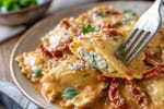 Ravioli with Sun Dried Tomato Cream Sauce recipe from Hearthday Table