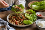 Thai Basil Chicken Lettuce Cups recipe from Sage & Millet Kitchen