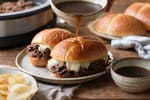 Slow-Simmer Slow Cooker French Dip Sandwiches recipe from Velvet Spoon Kitchen