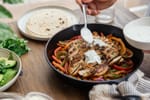 Seared Chicken Fajitas with Greek Yogurt Crema recipe from Macro Plate Co.