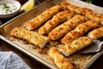 Mild Crispy Parmesan Fish Sticks Tray recipe from Little Fork Academy
