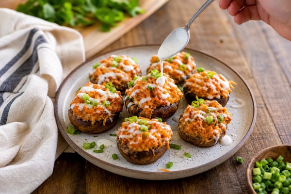 Cauliflower Buffalo Chicken Stuffed Mushrooms recipe from Carb Smart Table