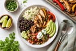 Tray Sheet-Pan Fajita Chicken Bowls recipe from Sunday Box Kitchen